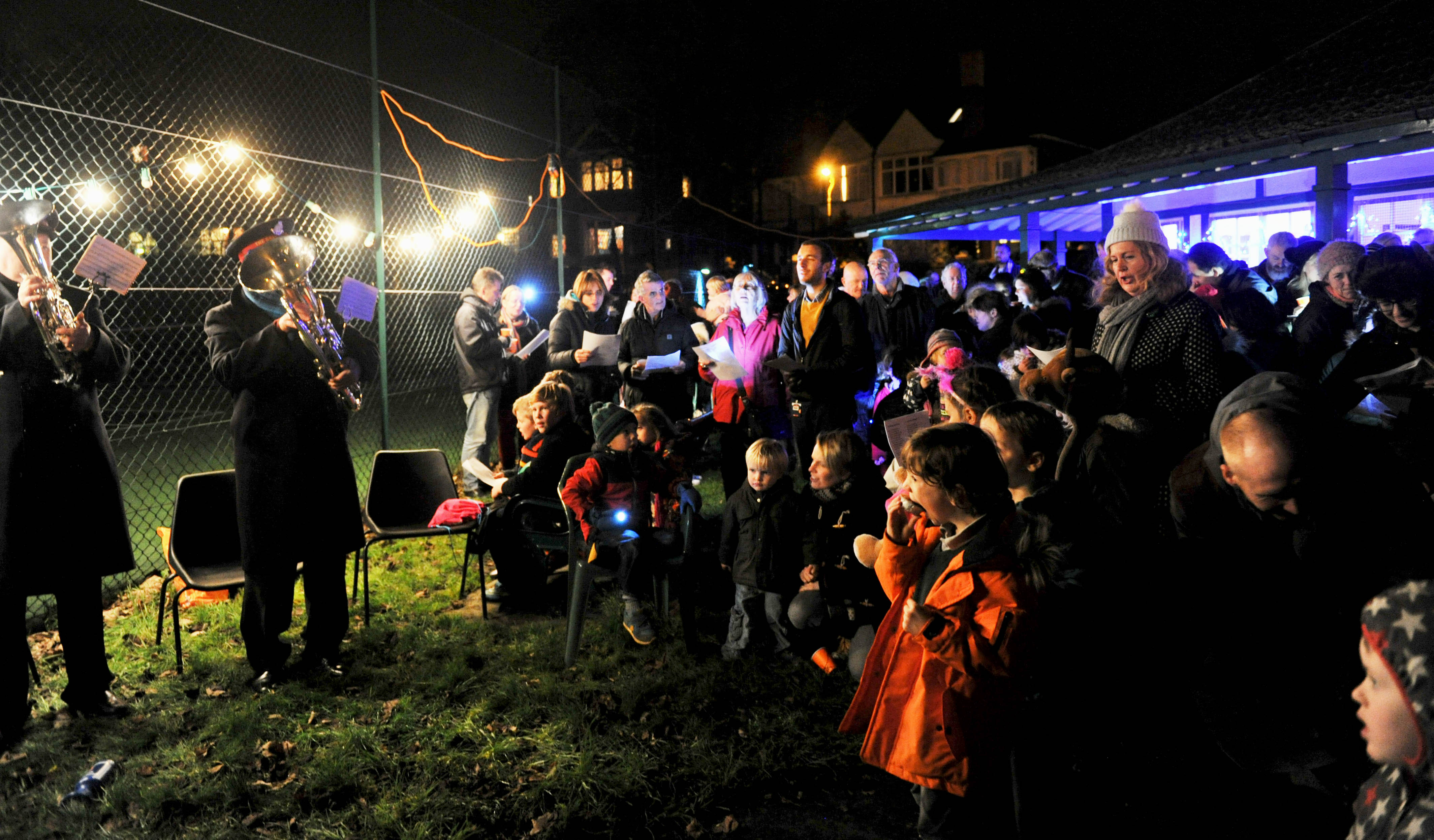 Hundreds turned out to enjoy the Friends of Queens Park 'Carols in the Park' event this year sponsored by Butler's Wine Cellar and music supplied by the Salvation Army with mince pies and mulled wine served up in the tennis club Photograph taken by Simon Dack